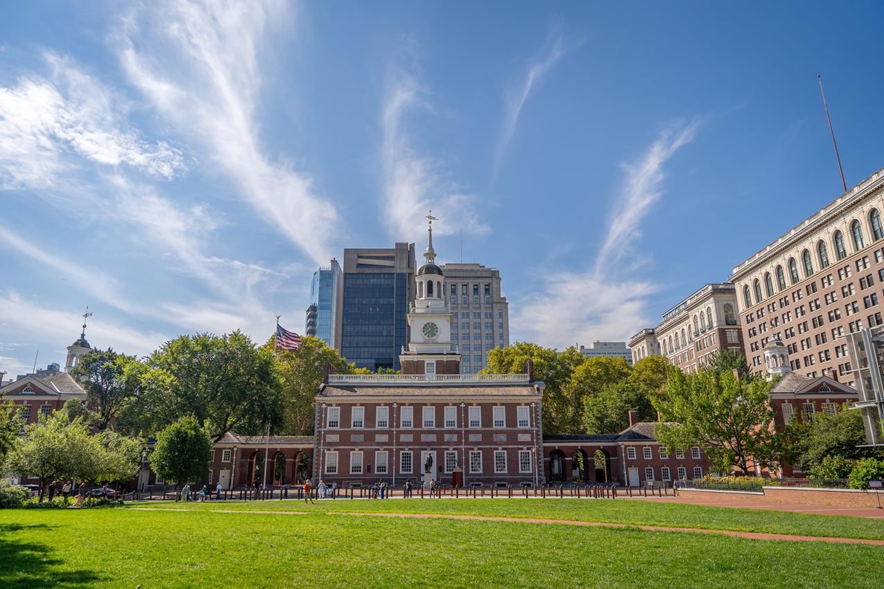 Color photo of Independence Hall as seen from the north side of Chestnut Street.  
