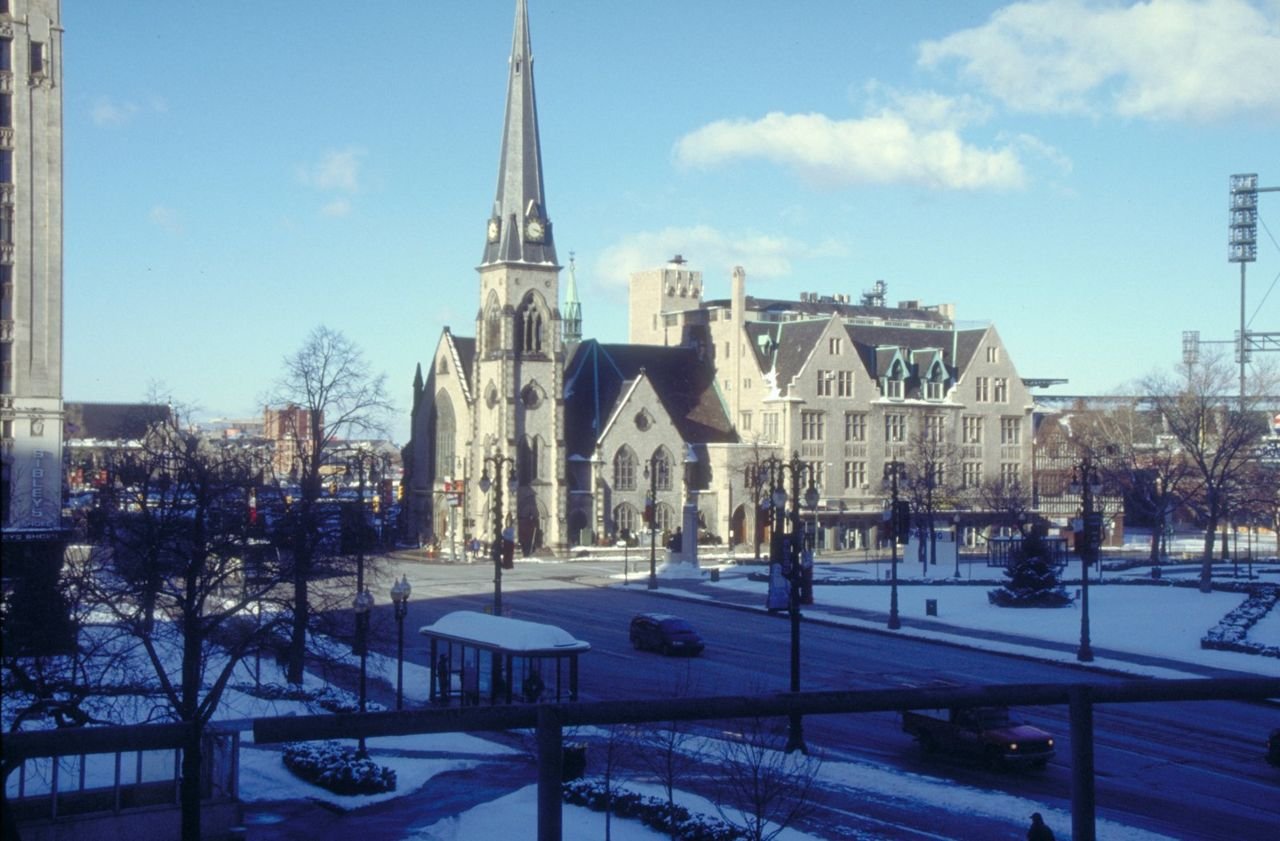 A beautiful grey brick church, near Comerica Park, on the Woodward Avenue Scenic Byway.