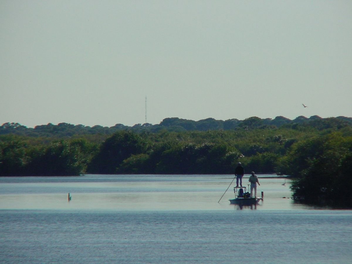 Men fish off a flat near the Indian River Lagoon National Scenic Byway.